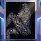 A 96x120" inch multi-print wall art piece displayed in a modern interior hallway, featuring an abstract stylized human female figure made of white curved lines on a black background.